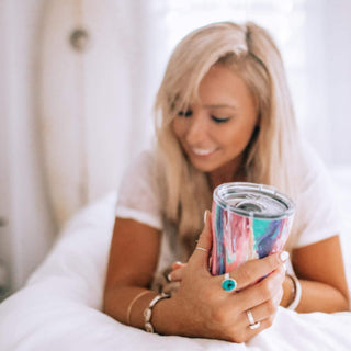 Woman in bedroom holding Cotton Candy Tumbler