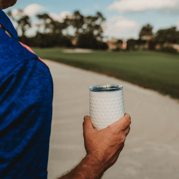 Dimpled Golf Stainless steel tumbler at the golf course